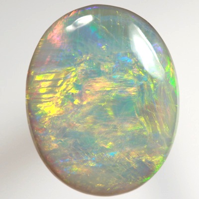 SOLID SEMI BLACK OPAL Bright orange, green and yellow over blue. SEE VIDEO